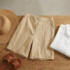 Short lin femme ivoire beige – flat lay bois chapeau sandales